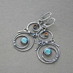 Earrings with blue and orange stones
