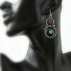Earrings with blue and orange stones