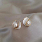 Luxurious white opal earrings with pearls in gold