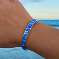 Silver bracelet with blue opal stone