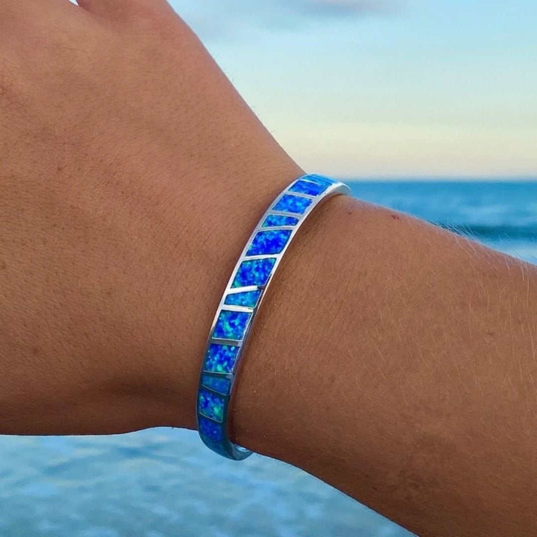 Silver bracelet with blue opal stone