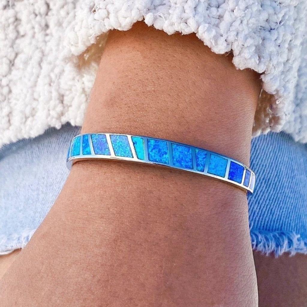 Silver bracelet with blue opal stone