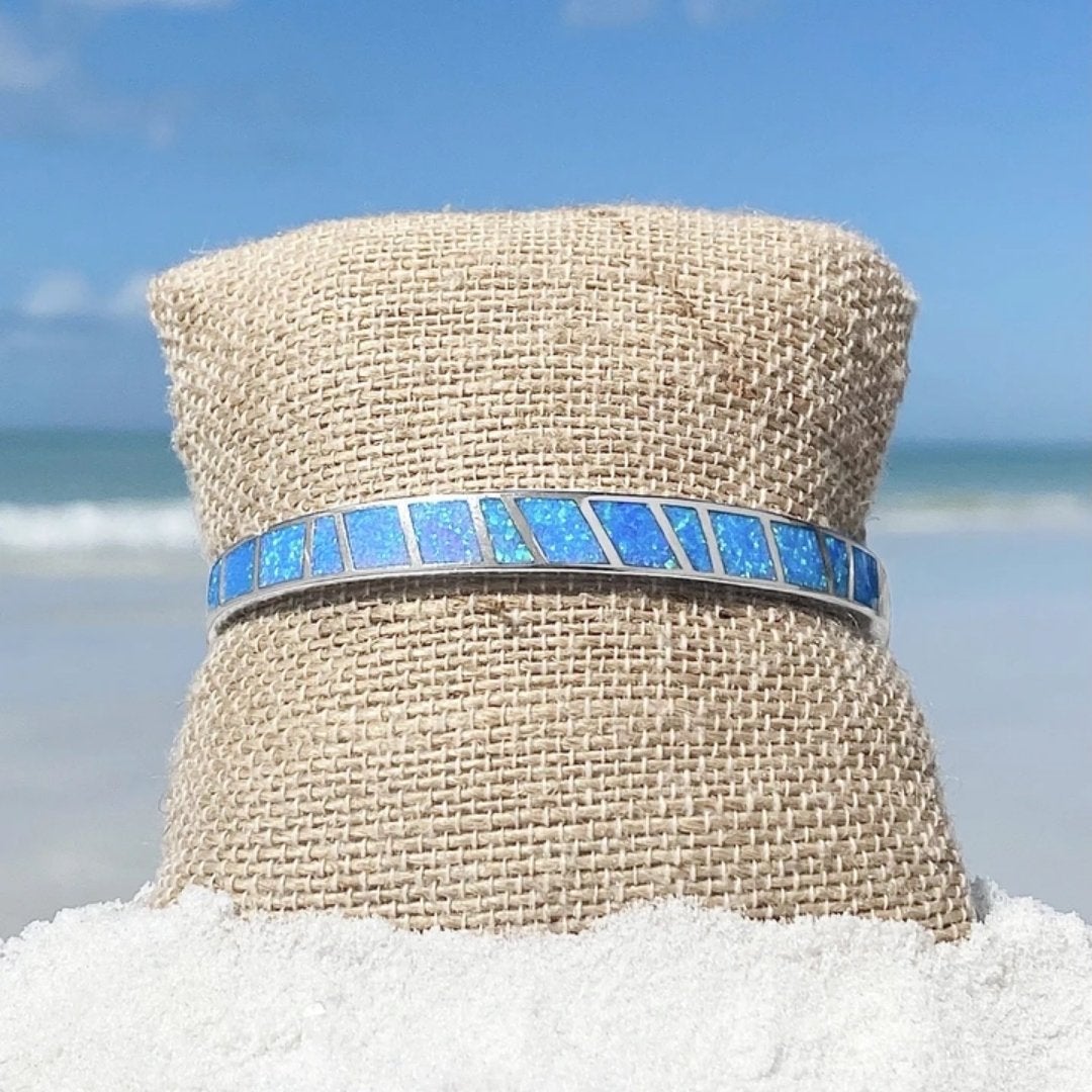Silver bracelet with blue opal stone