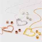 Personalized heart necklace with the option to attach rings and custom name engravings