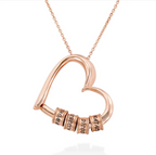 Personalized heart necklace with the option to attach rings and custom name engravings