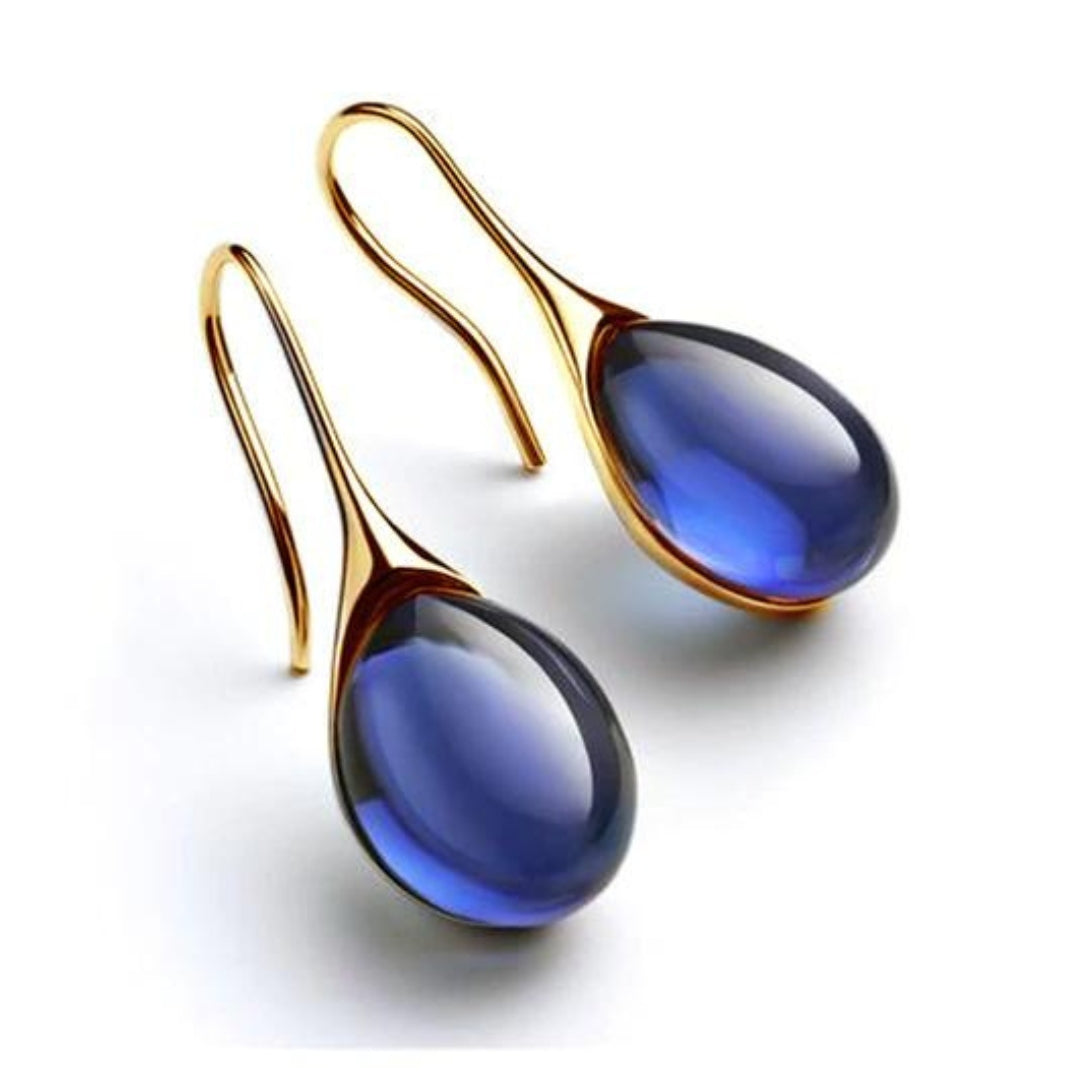 Gold drop earrings with smooth crystal