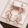Shiny earrings with crystal stones in gold