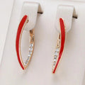 Gold-plated elegant earrings with red enamel