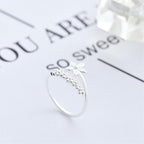 Adjustable ring made of 925 sterling silver with hand-painted enamel wildflower design