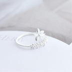Adjustable ring made of 925 sterling silver with hand-painted enamel wildflower design