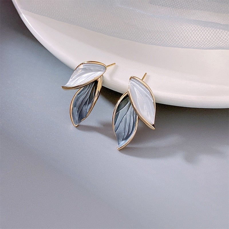 Luxury earrings with wings made of hand-painted enamel