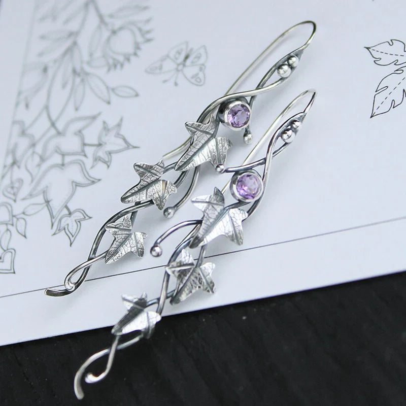 Elf earrings with blue crystal