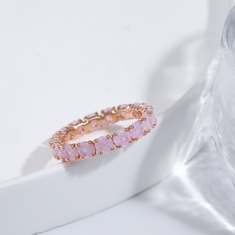 Luxurious gold ring with colored zirconia stones