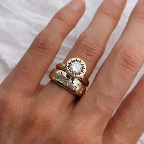 Set of forged crystal gold rings in vintage style