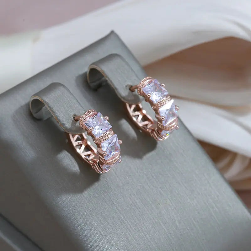 Elegant earrings inlaid with golden crystals