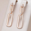 Hollow dangling earrings made of gold