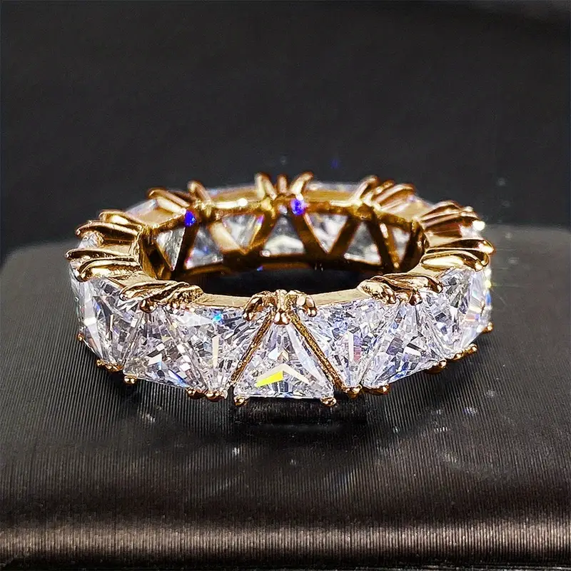 Golden ring with crystals