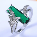 Silver ring with elegant green crystal