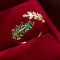 Open ring with green zirconia leaves