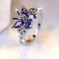 Silver ring with purple butterfly